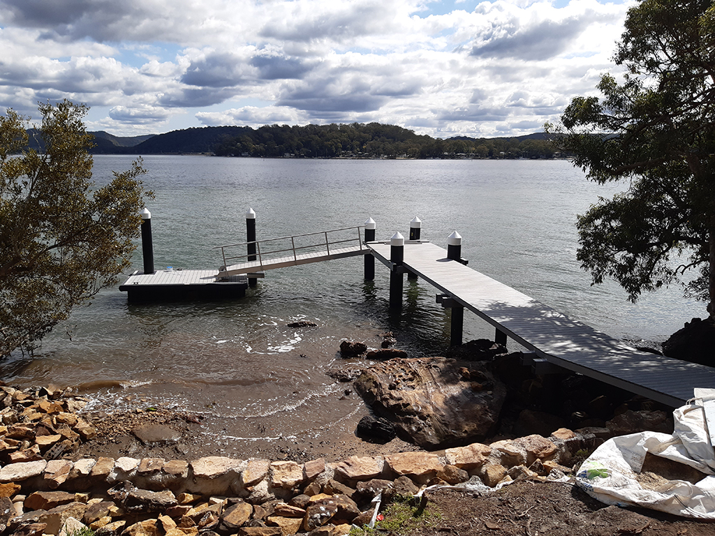 Pile reconditioning and sleeving by upgrading and protecting existing structures.
